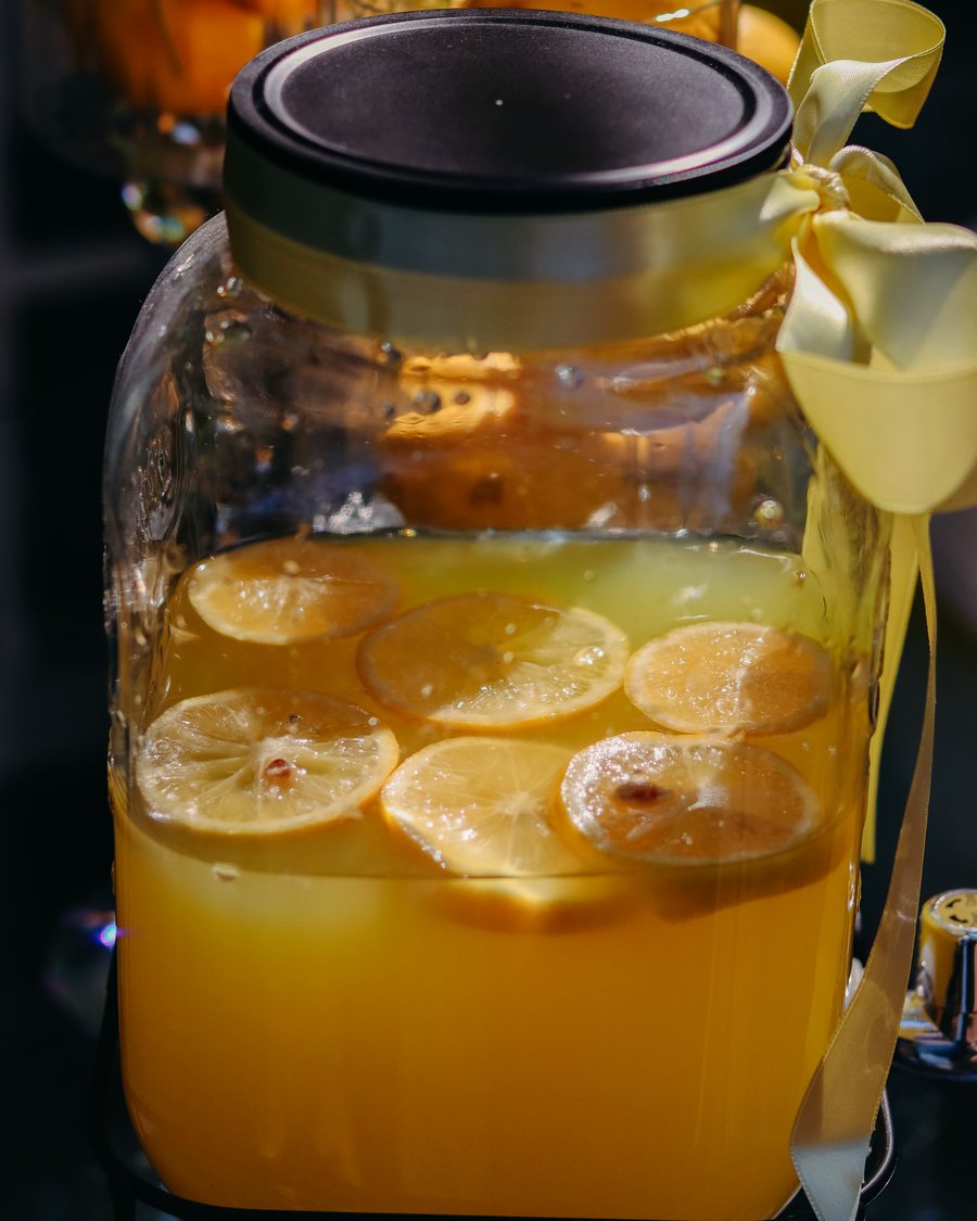 Lemonade jar styled for a wedding drinks table